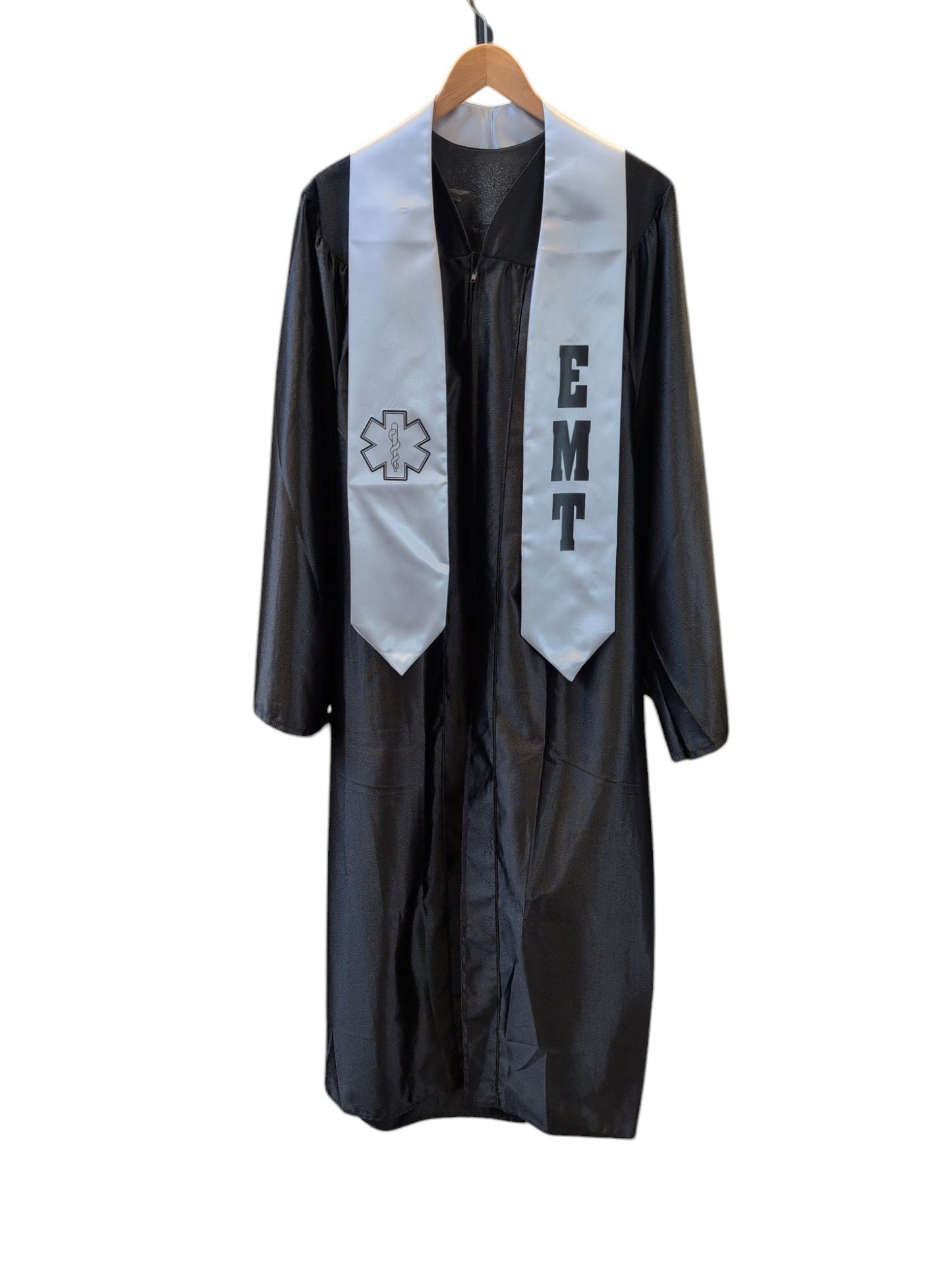 Rocky Mountain Balfour black graduation gown with a white EMT stole featuring the Star of Life emblem and EMT text.